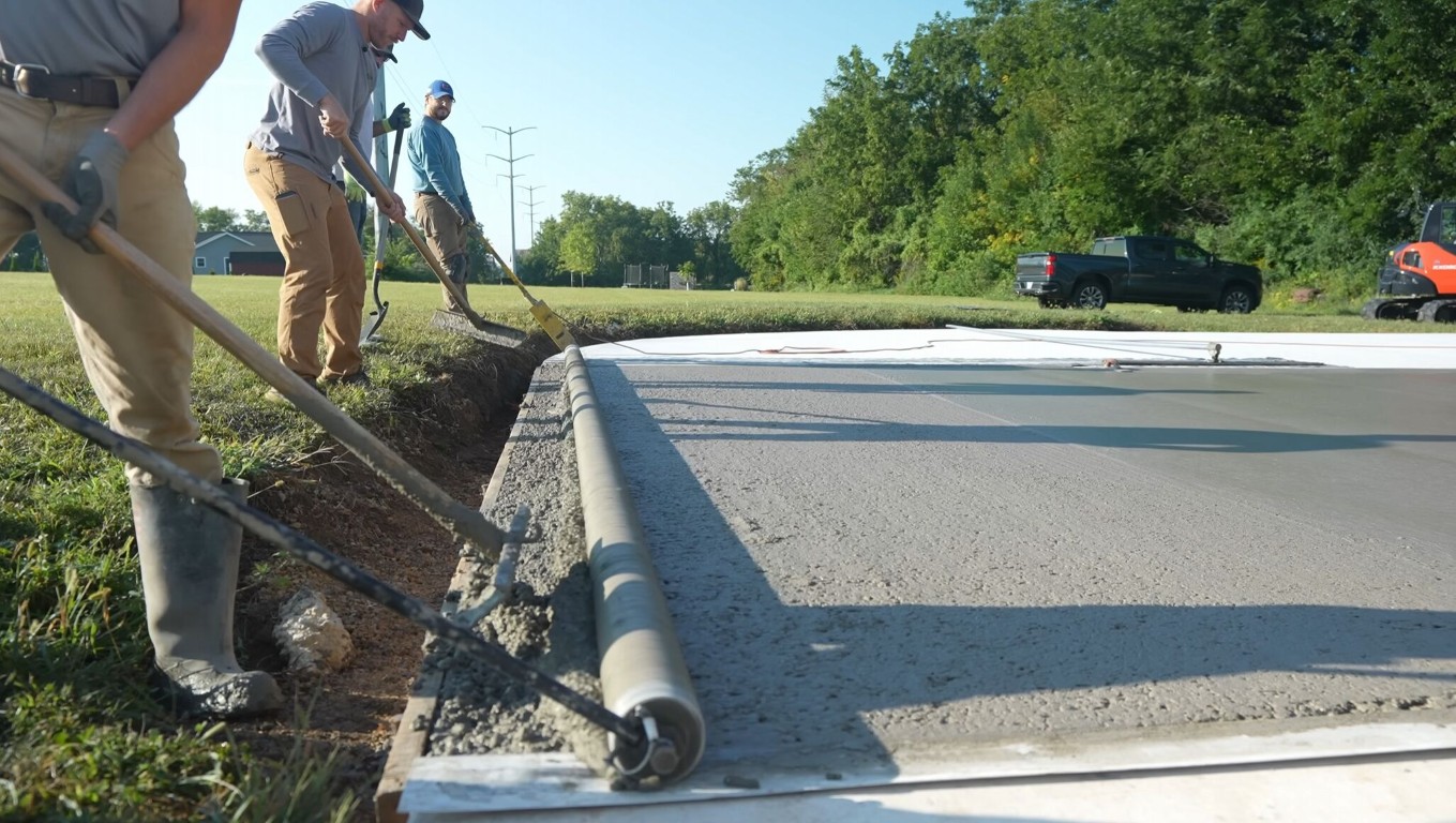 Professional concrete crew finishing a driveway in Castro Valley