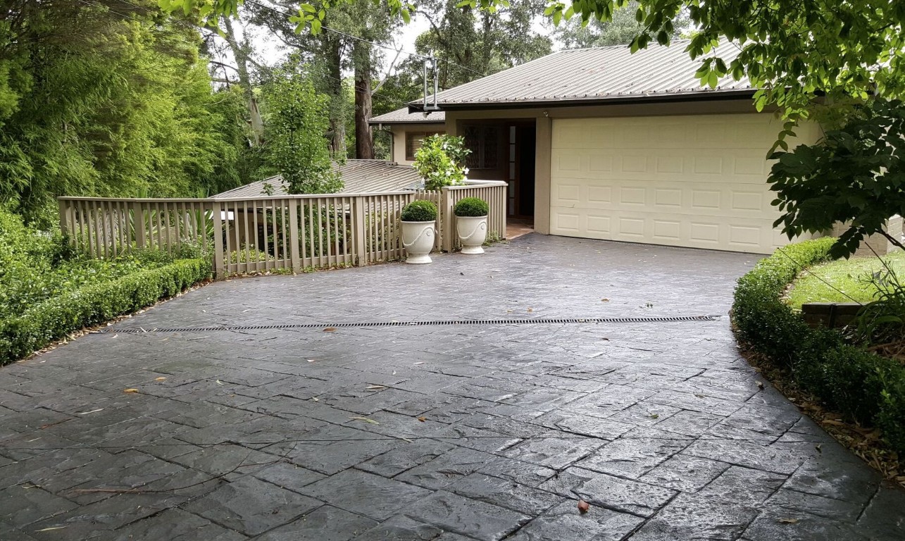 Professional stamped concrete driveway installation